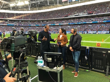 Sideline interview with Heisman Trophy winner and NFL great Eddie George at the NFL game in London at Wembley Stadium between the Chargers & Titans